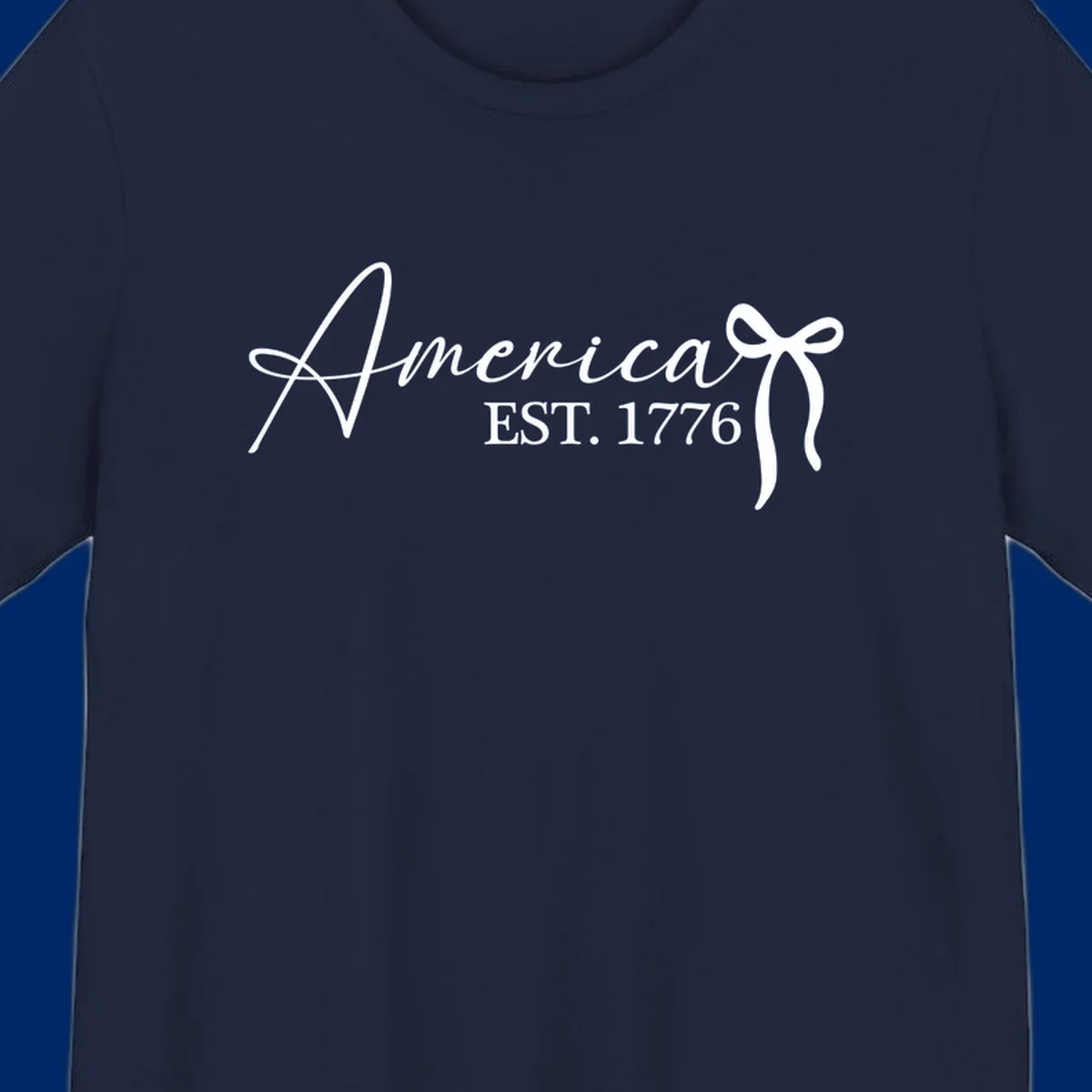 White script text "America" with decorative flourishes above "EST. 1776" in serif font, on a black background. Design for america-est-1776.