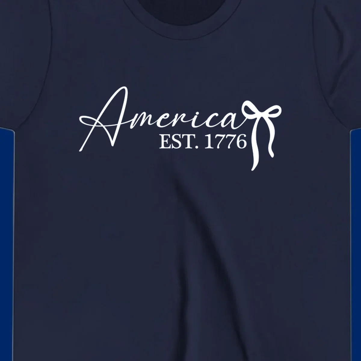 White script text "America" with decorative flourishes above "EST. 1776" in serif font, on a black background. Design for america-est-1776.