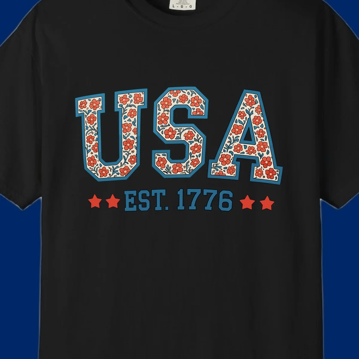 Illustrated text 'USA' with red flowers and blue leaves, above blue 'EST. 1776' text flanked by red stars. Concept: usa-est-1776-floral.