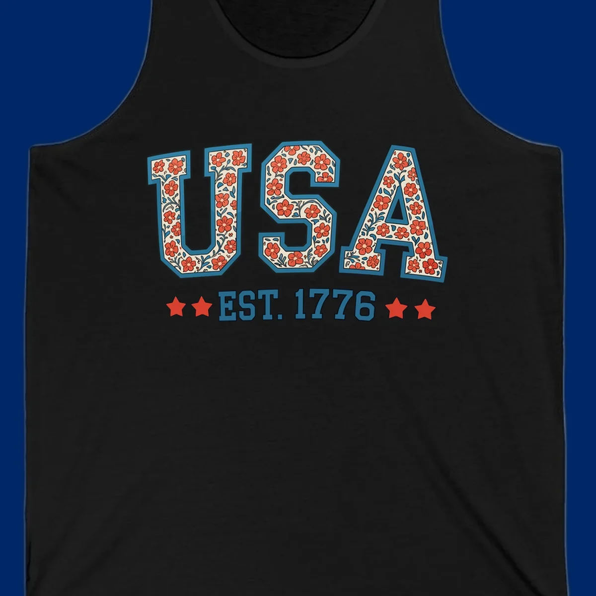 Illustrated text 'USA' with red flowers and blue leaves, above blue 'EST. 1776' text flanked by red stars. Concept: usa-est-1776-floral.