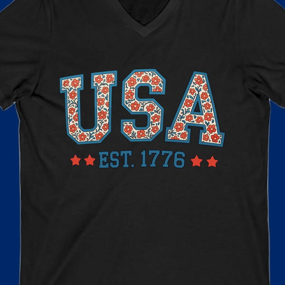Illustrated text 'USA' with red flowers and blue leaves, above blue 'EST. 1776' text flanked by red stars. Concept: usa-est-1776-floral.