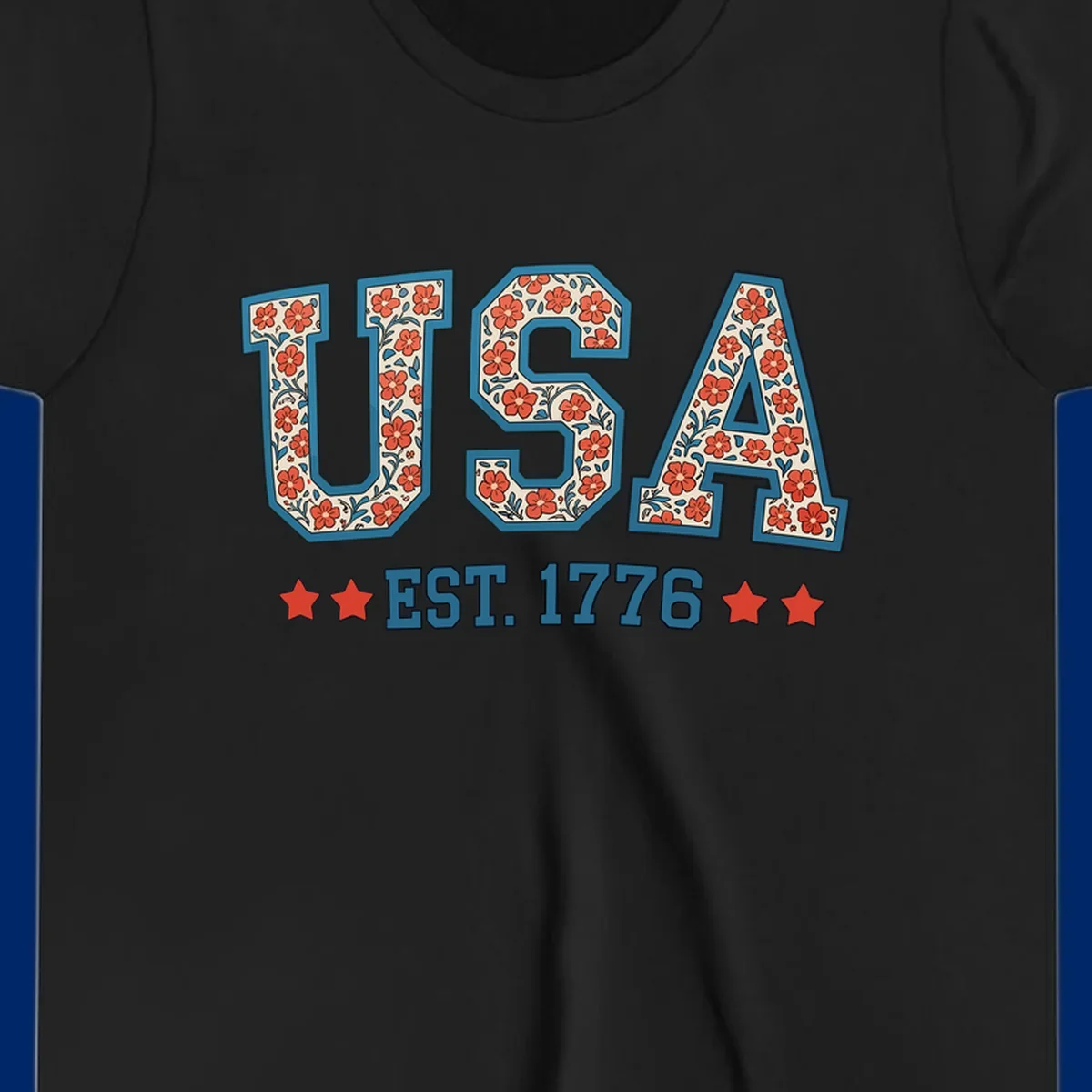 Illustrated text 'USA' with red flowers and blue leaves, above blue 'EST. 1776' text flanked by red stars. Concept: usa-est-1776-floral.