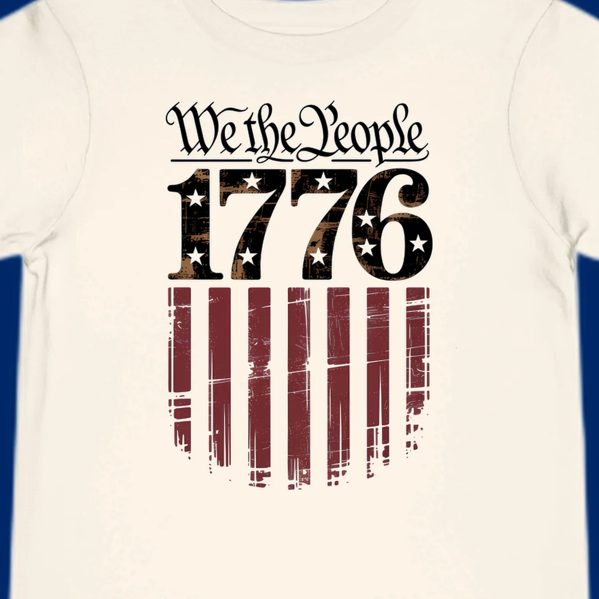 A distressed patriotic design featuring 'We the People' in script, '1776' with stars, and red stripes below, embodying the we-the-people-1776-flag theme.