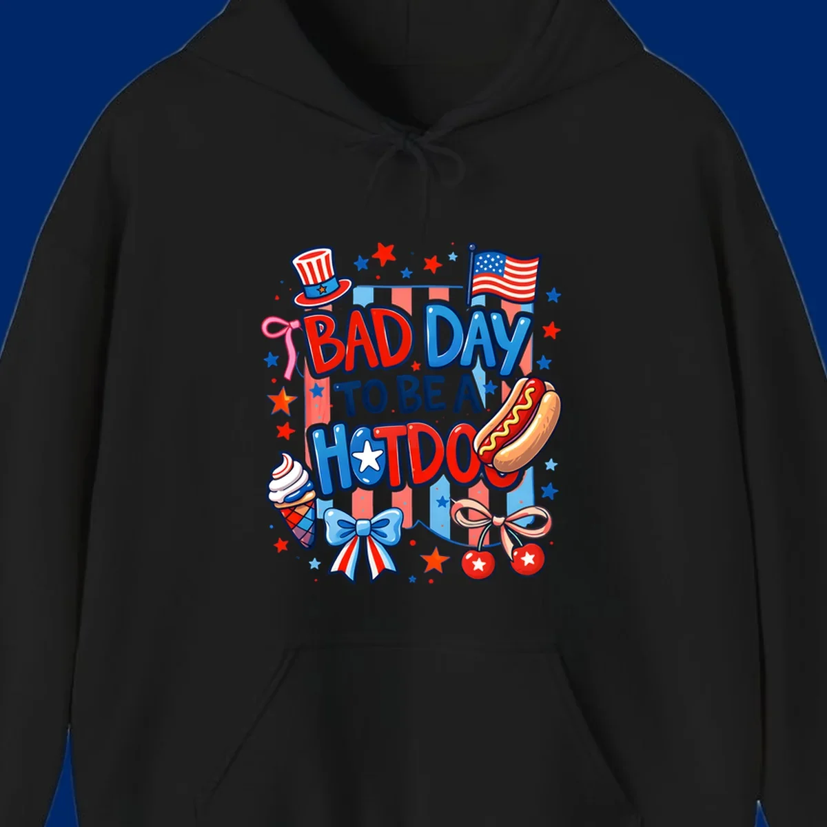 A patriotic illustration with the text 'BAD DAY TO BE A HOTDOG' surrounded by an Uncle Sam hat, American flag, hot dog, ice cream, bows, and stars, capturing a bad-day-hotdog-july-4th theme.