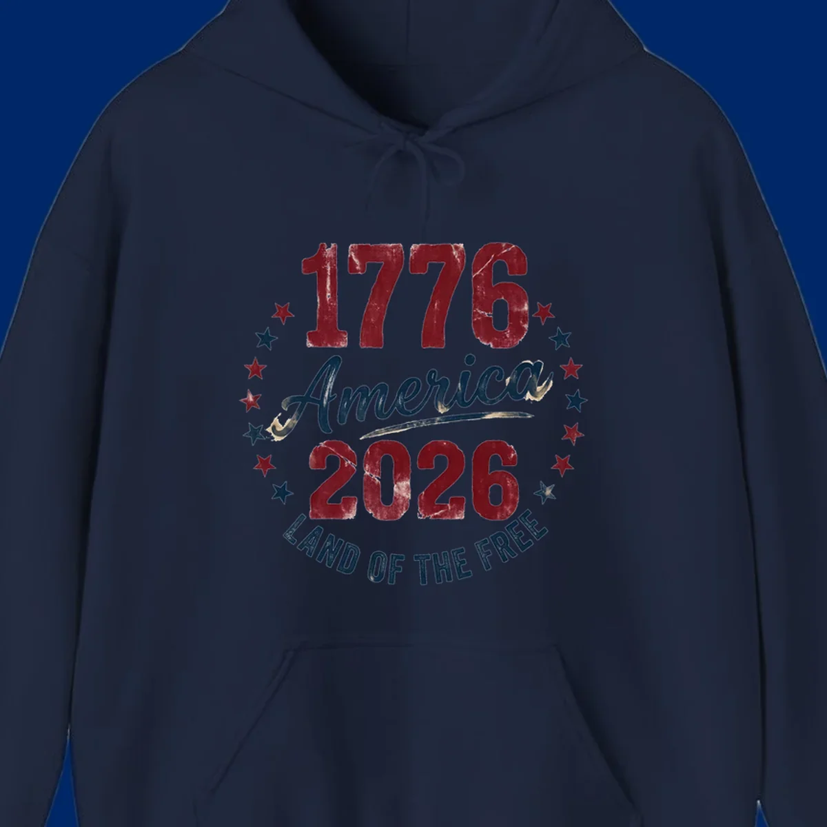 Distressed circular design with '1776', 'America', '2026', and 'LAND OF THE FREE' text, encircled by stars, celebrating America's 250th anniversary.