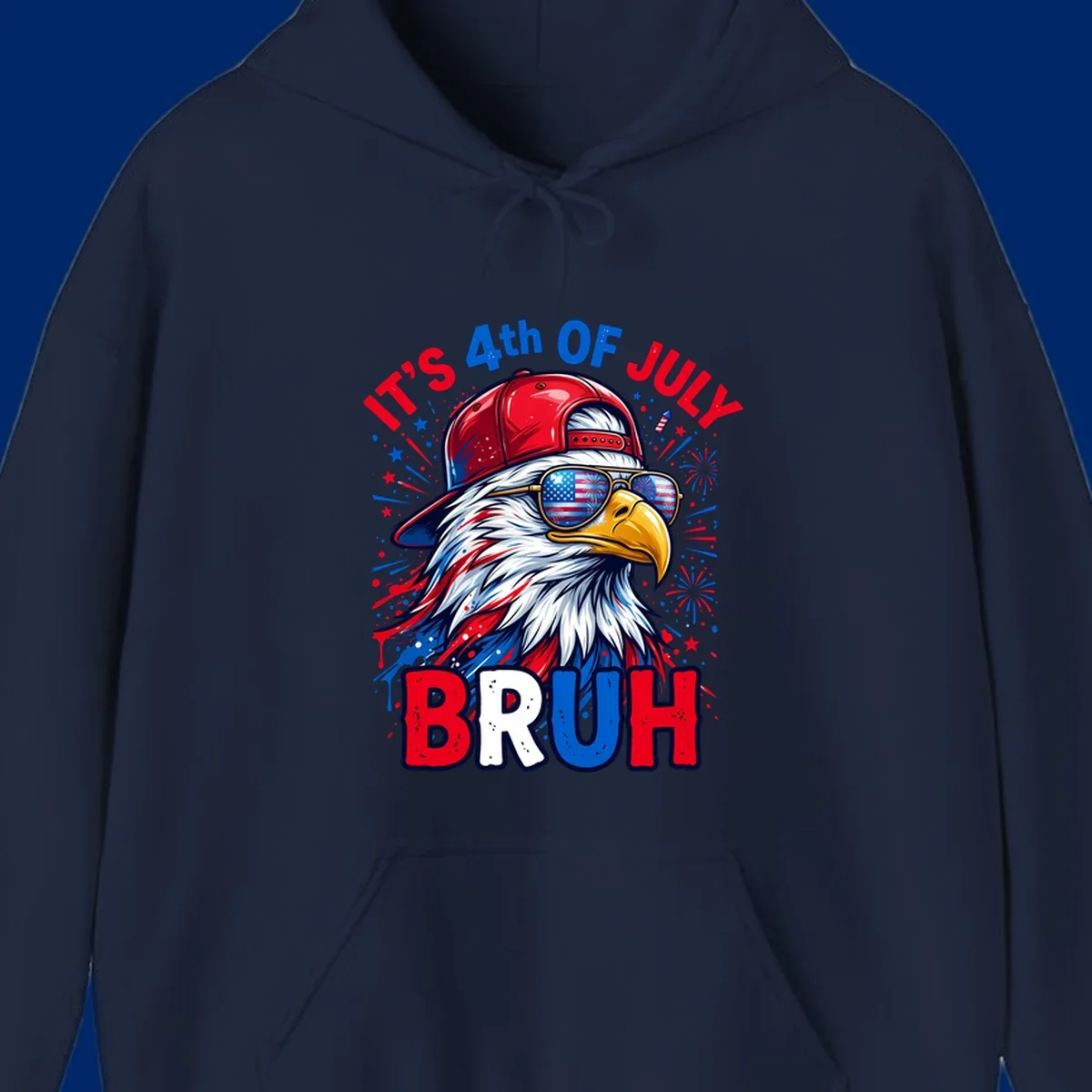 An illustrated bald eagle wearing a red cap and American flag sunglasses with fireworks and the text 'IT'S 4th OF JULY BRUH', emphasizing the fourth-of-july-bruh-eagle concept.