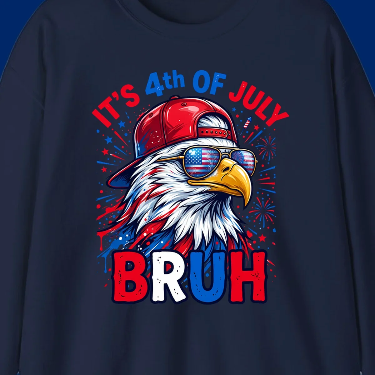 An illustrated bald eagle wearing a red cap and American flag sunglasses with fireworks and the text 'IT'S 4th OF JULY BRUH', emphasizing the fourth-of-july-bruh-eagle concept.
