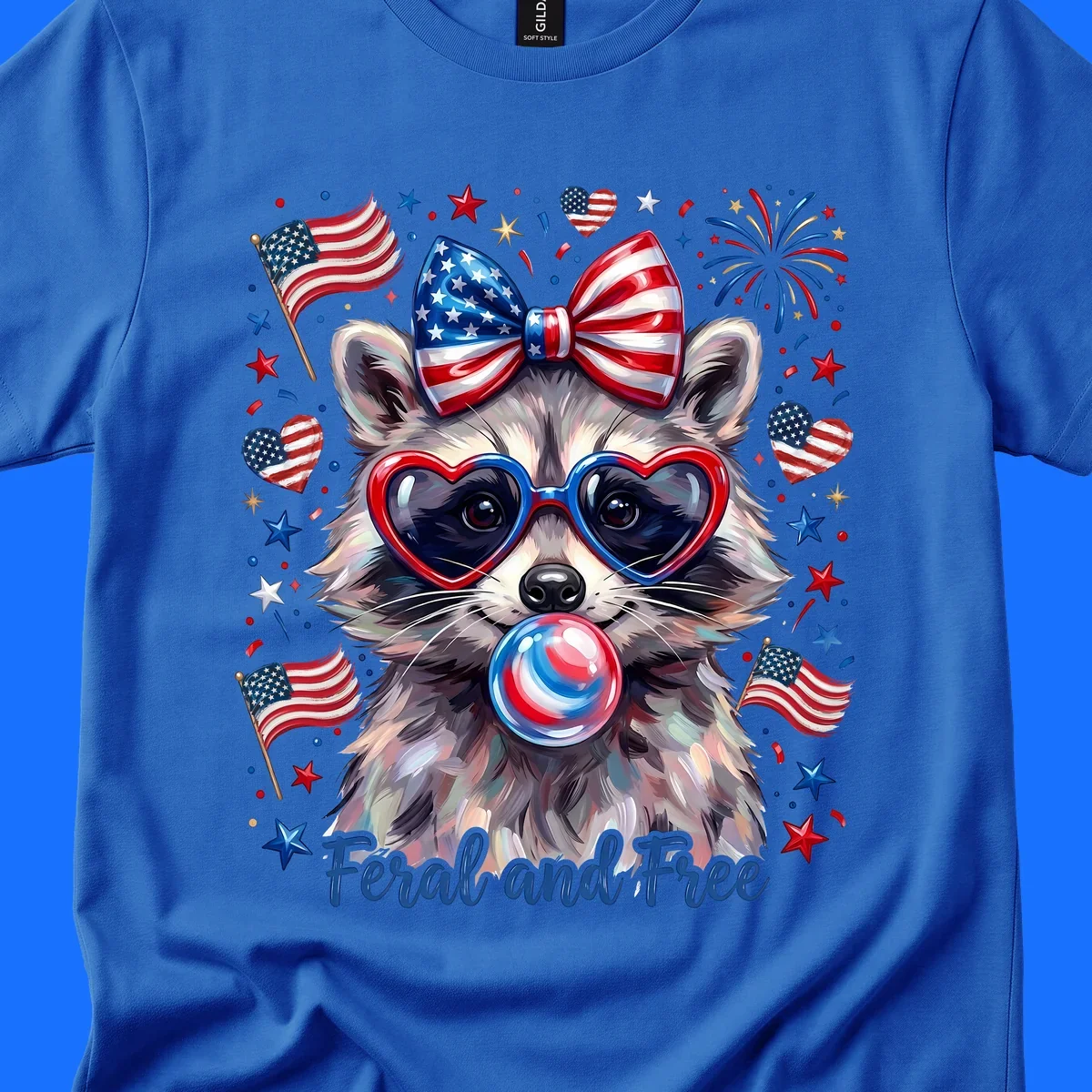 Watercolor illustration of a patriotic raccoon wearing heart sunglasses, blowing bubblegum, with American flags, fireworks, and 'Feral and Free' text for a patriotic-raccoon-july-4th celebration.