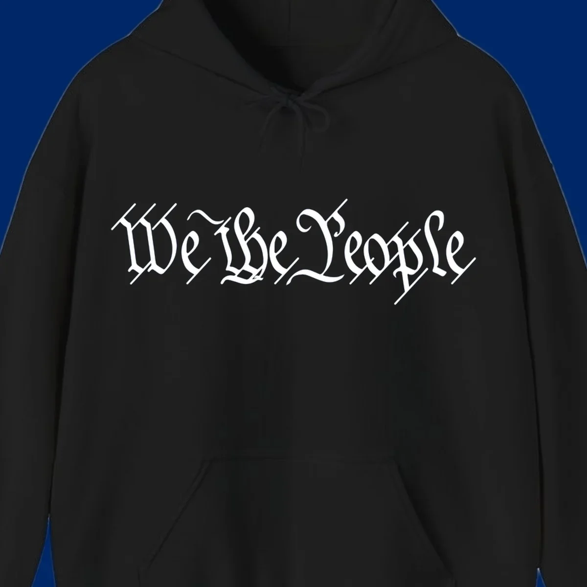 The phrase 'WE THE PEOPLE' is written in a decorative white calligraphic font, representing the we-the-people-heritage.