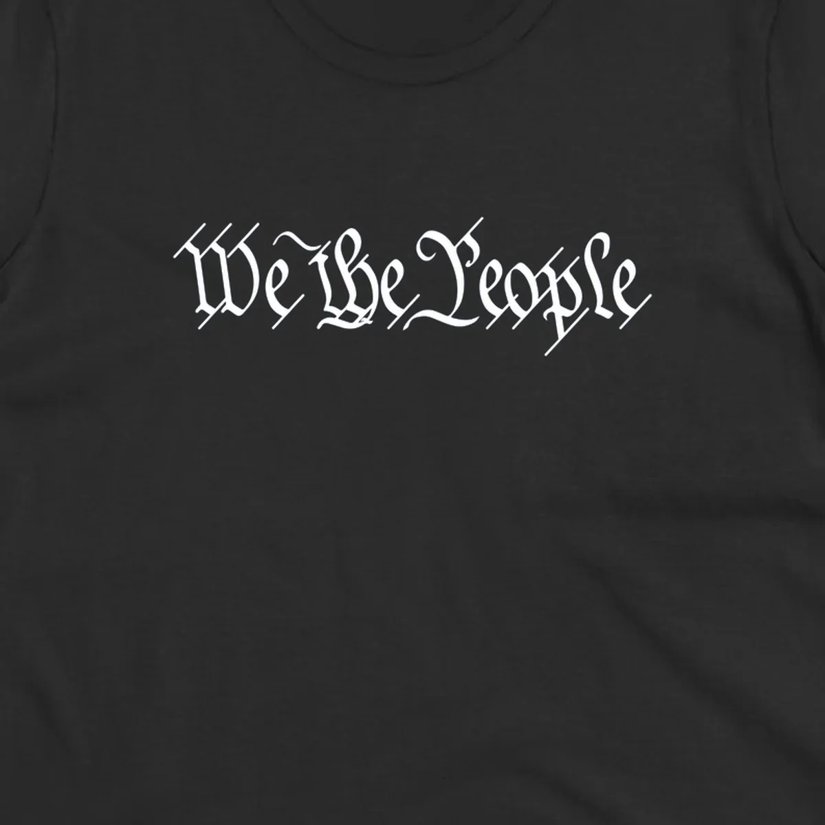 The phrase 'WE THE PEOPLE' is written in a decorative white calligraphic font, representing the we-the-people-heritage.