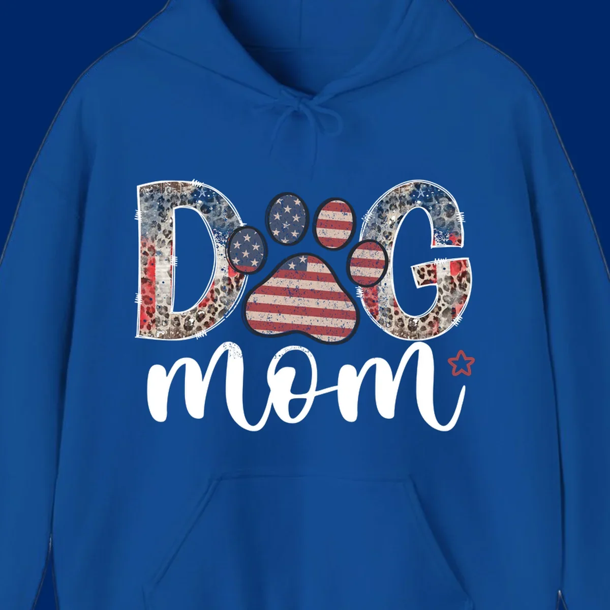 A graphic spelling 'DOG' with a patriotic-dog-paw-print. The 'D' and 'G' have leopard print and flag elements, and the 'O' is a flag paw print.