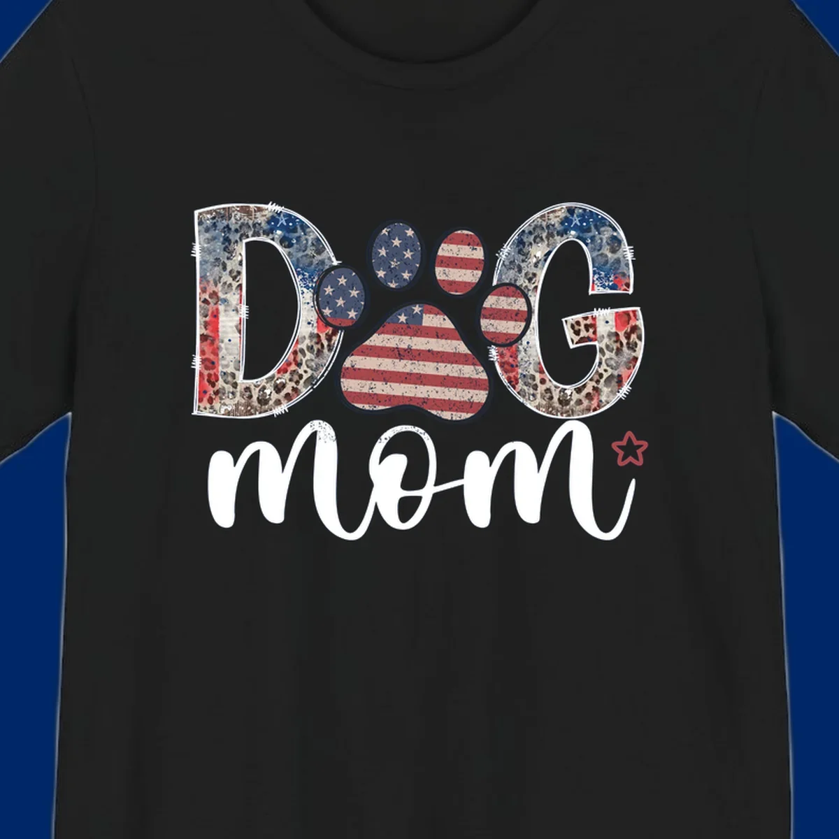 A graphic spelling 'DOG' with a patriotic-dog-paw-print. The 'D' and 'G' have leopard print and flag elements, and the 'O' is a flag paw print.
