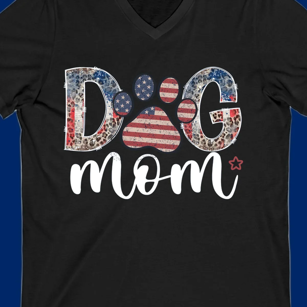 A graphic spelling 'DOG' with a patriotic-dog-paw-print. The 'D' and 'G' have leopard print and flag elements, and the 'O' is a flag paw print.