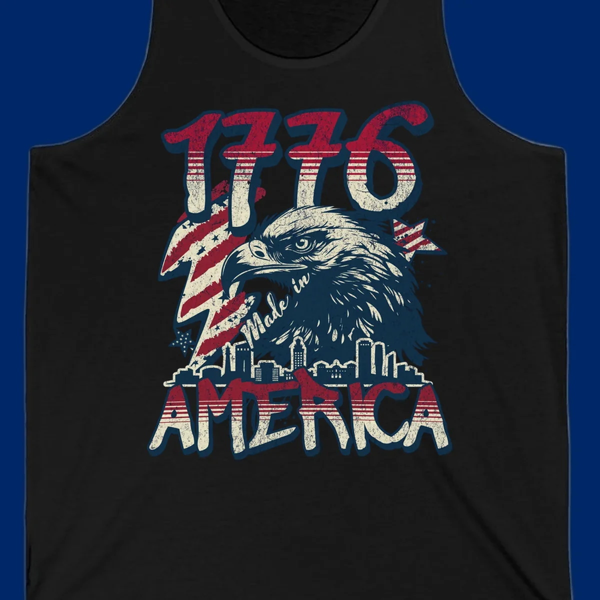 Vintage 1776 Made in America design with a bald eagle, city skyline, and American flag pattern. Features distressed red, cream, and navy colors.