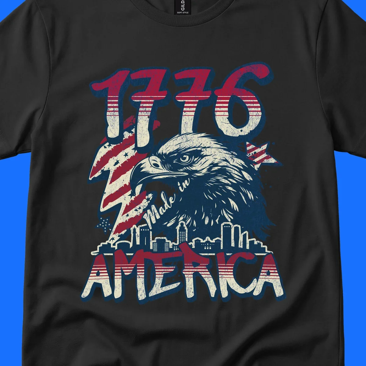 Vintage 1776 Made in America design with a bald eagle, city skyline, and American flag pattern. Features distressed red, cream, and navy colors.