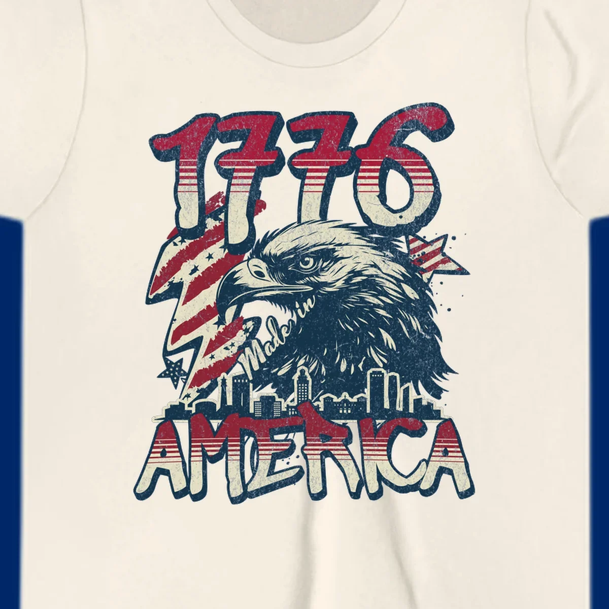 Vintage 1776 Made in America design with a bald eagle, city skyline, and American flag pattern. Features distressed red, cream, and navy colors.