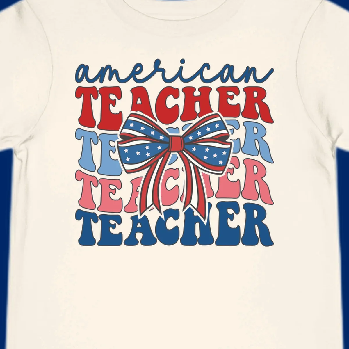 A graphic design reading 'american TEACHER' with the word TEACHER repeated four times, featuring a large patriotic American flag bow with stars and stripes. The text is in red, blue, and pink colors, outlined in dark gray.