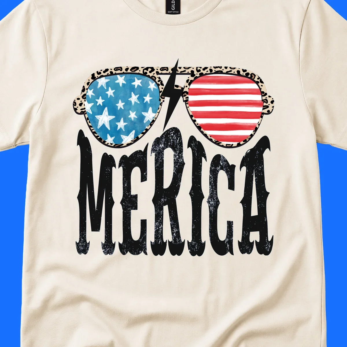 Leopard print frame sunglasses with American flag lenses and a lightning bolt, above the distressed text 'MERICA'. This leopard-merica-sunglasses design is perfect for patriotic celebrations.