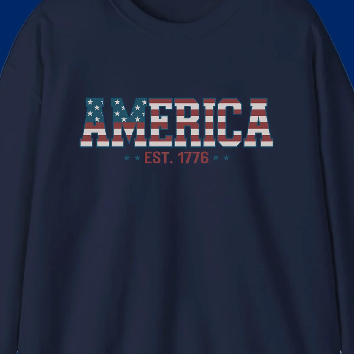 The word AMERICA in large block letters filled with a distressed American flag pattern, with EST. 1776 below flanked by stars, representing america-established-1776.