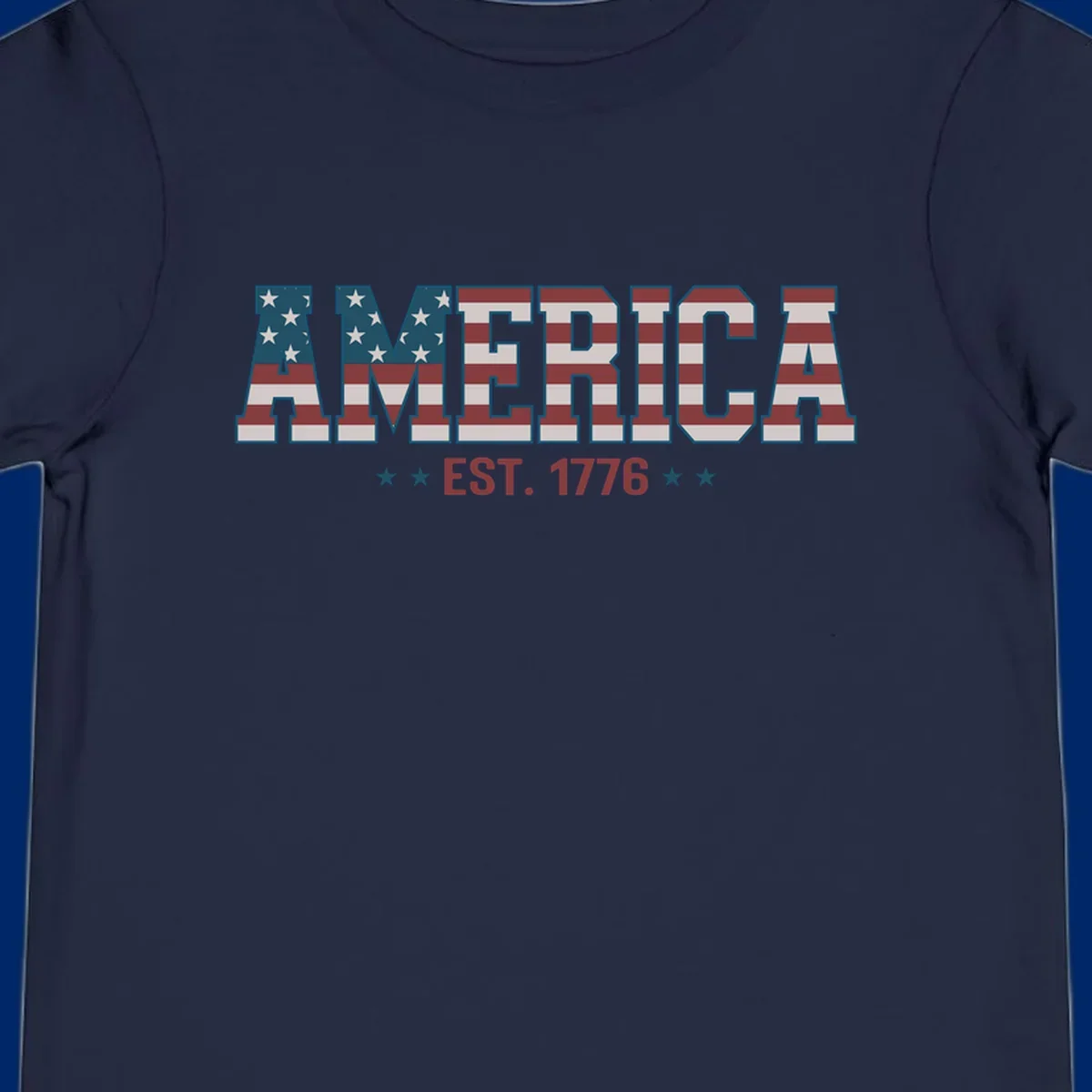 The word AMERICA in large block letters filled with a distressed American flag pattern, with EST. 1776 below flanked by stars, representing america-established-1776.