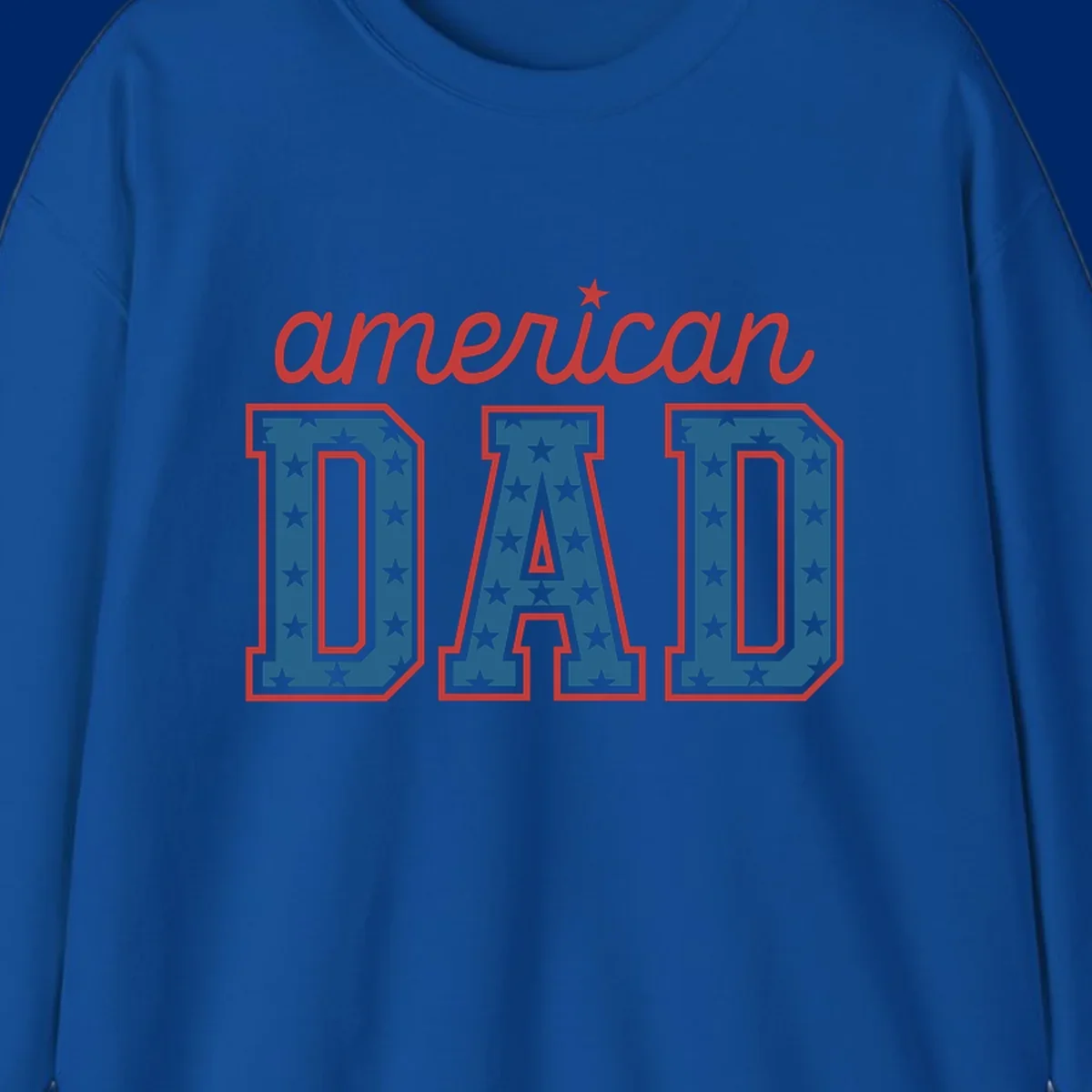 A patriotic design reading 'american DAD'. 'american' is red script with a star. 'DAD' is blue with white stars and a red outline, representing american-dad-patriotic-stars.