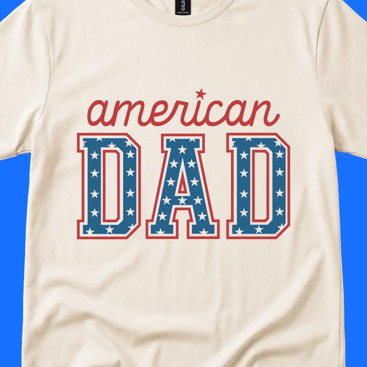 A patriotic design reading 'american DAD'. 'american' is red script with a star. 'DAD' is blue with white stars and a red outline, representing american-dad-patriotic-stars.