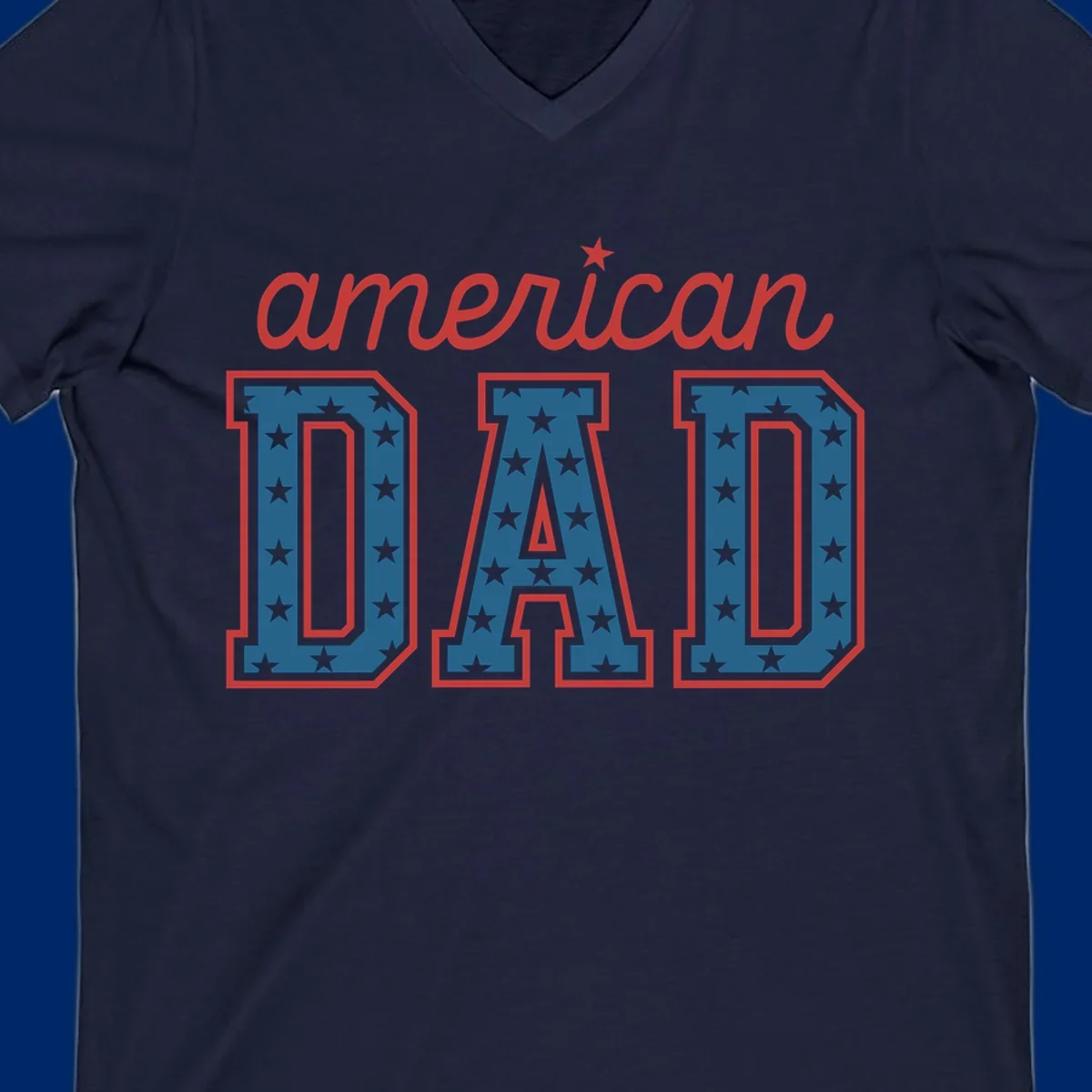 A patriotic design reading 'american DAD'. 'american' is red script with a star. 'DAD' is blue with white stars and a red outline, representing american-dad-patriotic-stars.