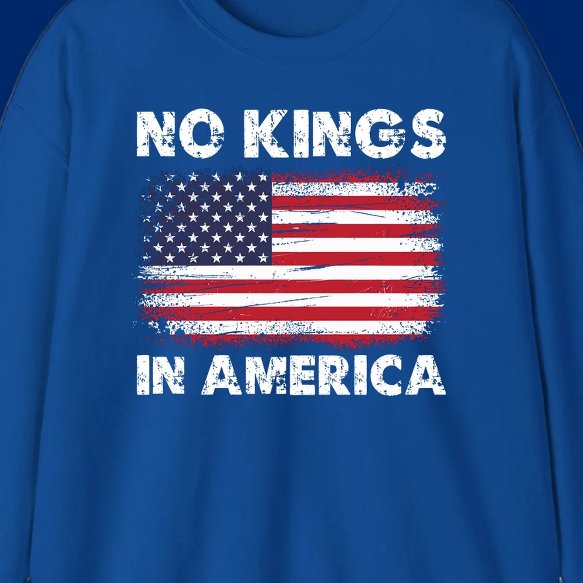 No Kings In America design featuring a distressed American flag and bold text.