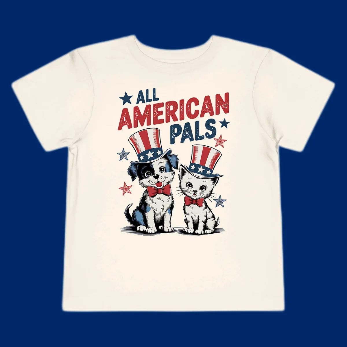 Illustration of a puppy and kitten wearing Uncle Sam hats and bow ties, with the text 'ALL AMERICAN PALS' and stars. A patriotic all-american-pals design.