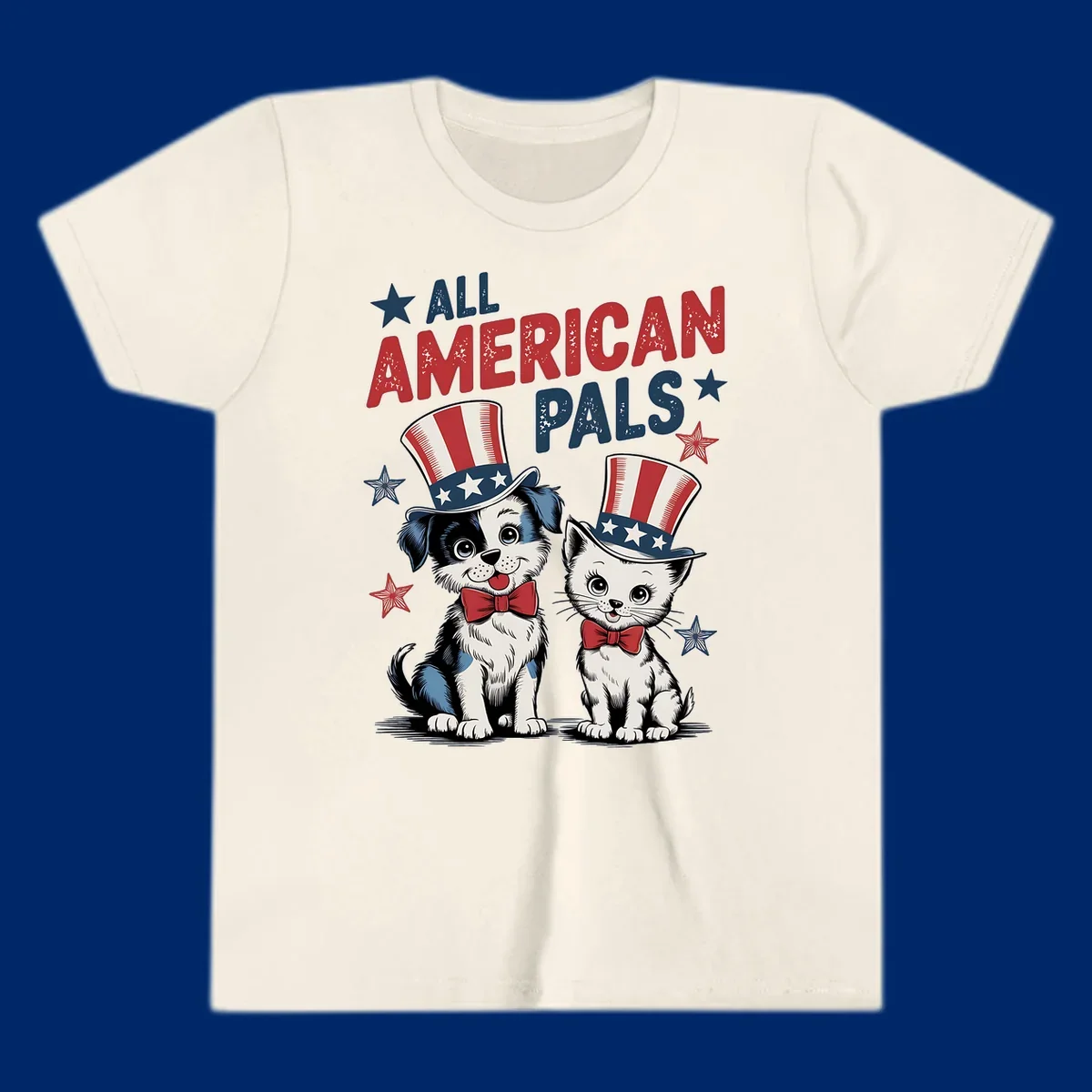 Illustration of a puppy and kitten wearing Uncle Sam hats and bow ties, with the text 'ALL AMERICAN PALS' and stars. A patriotic all-american-pals design.