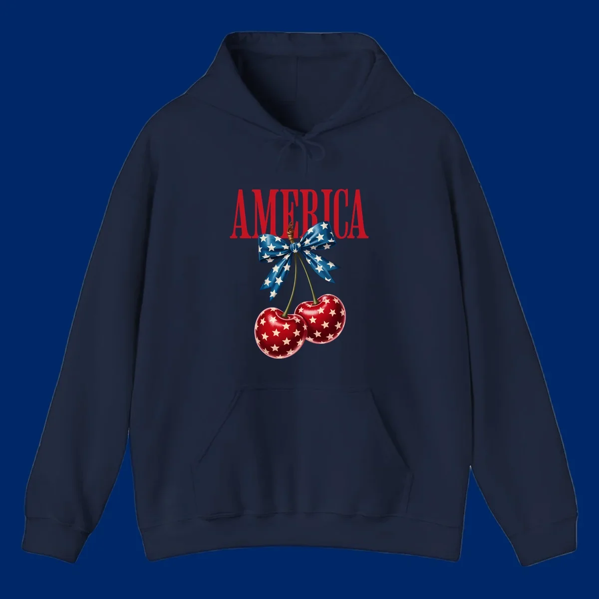 The word AMERICA in red above two red, white, and blue star-spangled cherries tied with a star bow. Features america-patriotic-cherries.