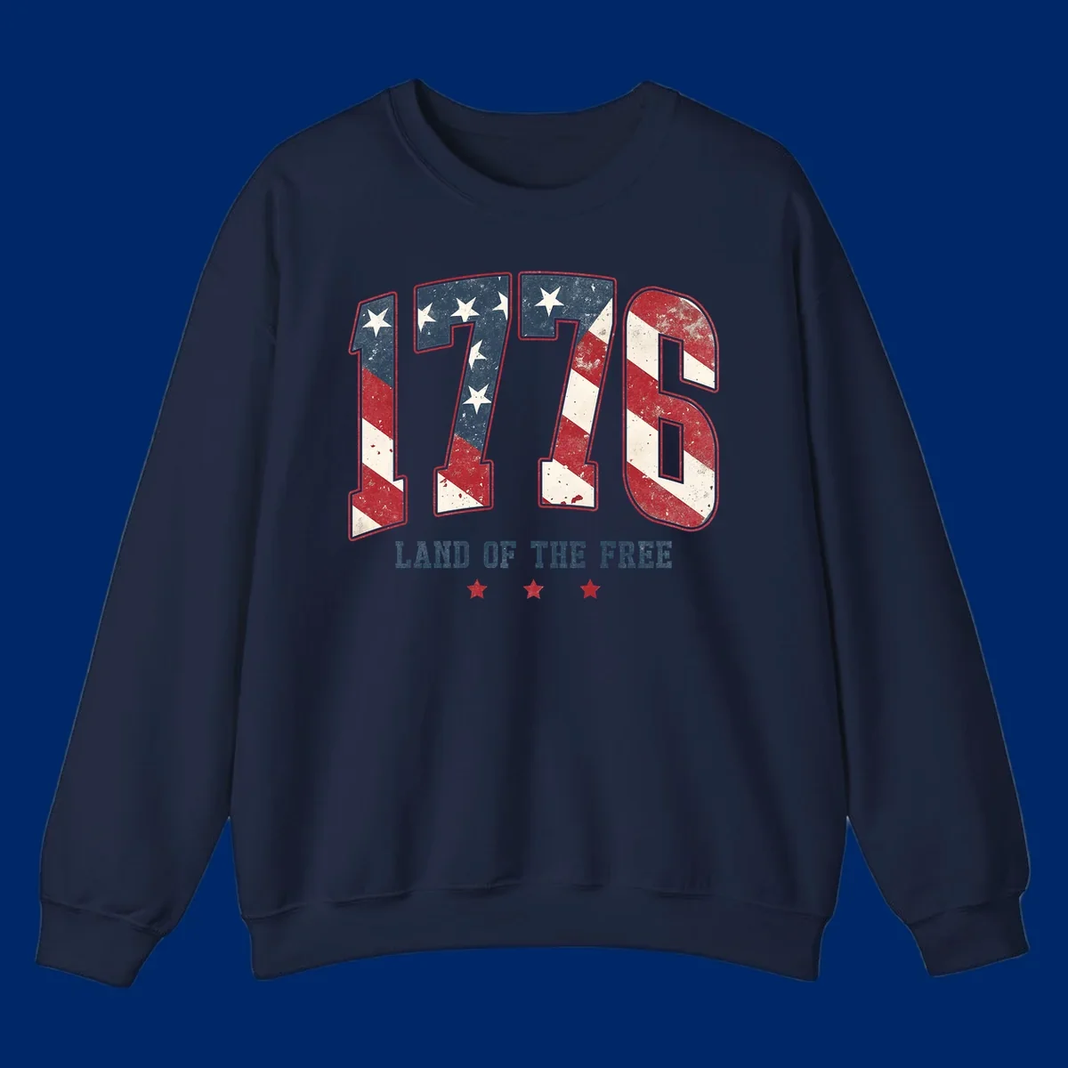 Vintage distressed design featuring the number 1776 in American flag colors and 'LAND OF THE FREE' text, celebrating America's history.