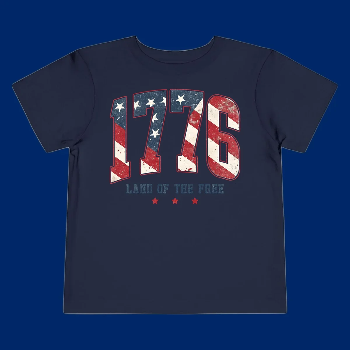 Vintage distressed design featuring the number 1776 in American flag colors and 'LAND OF THE FREE' text, celebrating America's history.