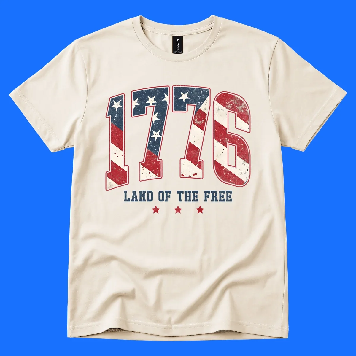 Vintage distressed design featuring the number 1776 in American flag colors and 'LAND OF THE FREE' text, celebrating America's history.