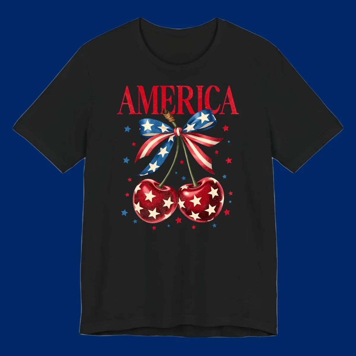 Vintage patriotic artwork featuring red 'AMERICA' text, two red cherries with white stars, and an American flag ribbon. Scattered red and blue stars complete this America-cherries-stars design.