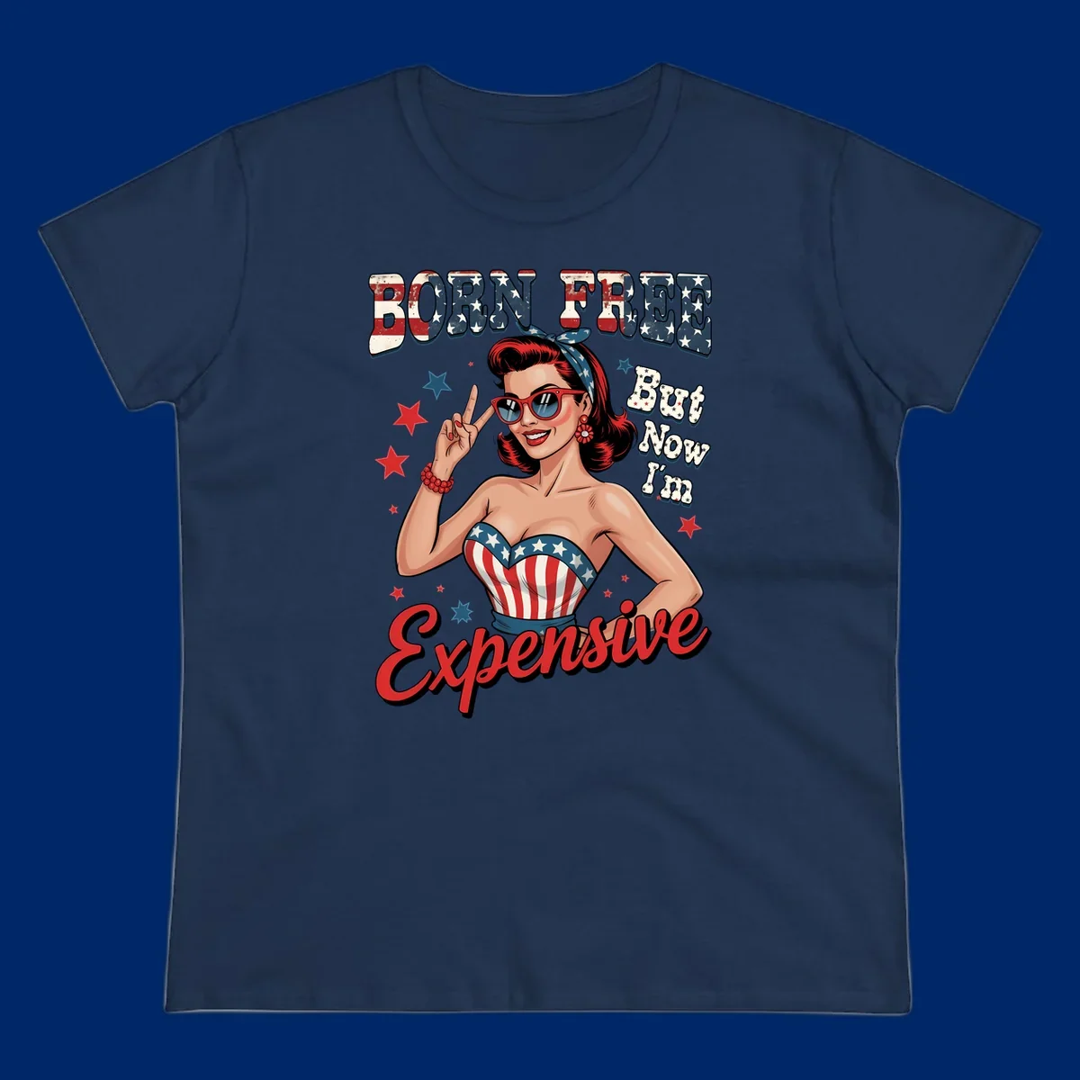 Retro pin-up girl making a peace sign, wearing a stars and stripes top, with the text 'BORN FREE But Now I'm Expensive'. This born-free-expensive-pin-up design is patriotic and fun.