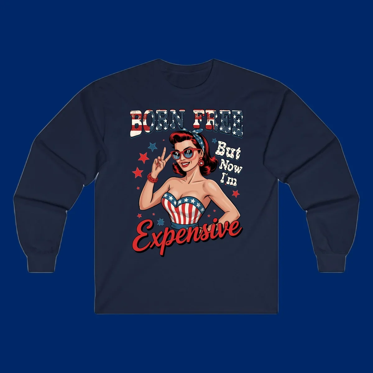 Retro pin-up girl making a peace sign, wearing a stars and stripes top, with the text 'BORN FREE But Now I'm Expensive'. This born-free-expensive-pin-up design is patriotic and fun.