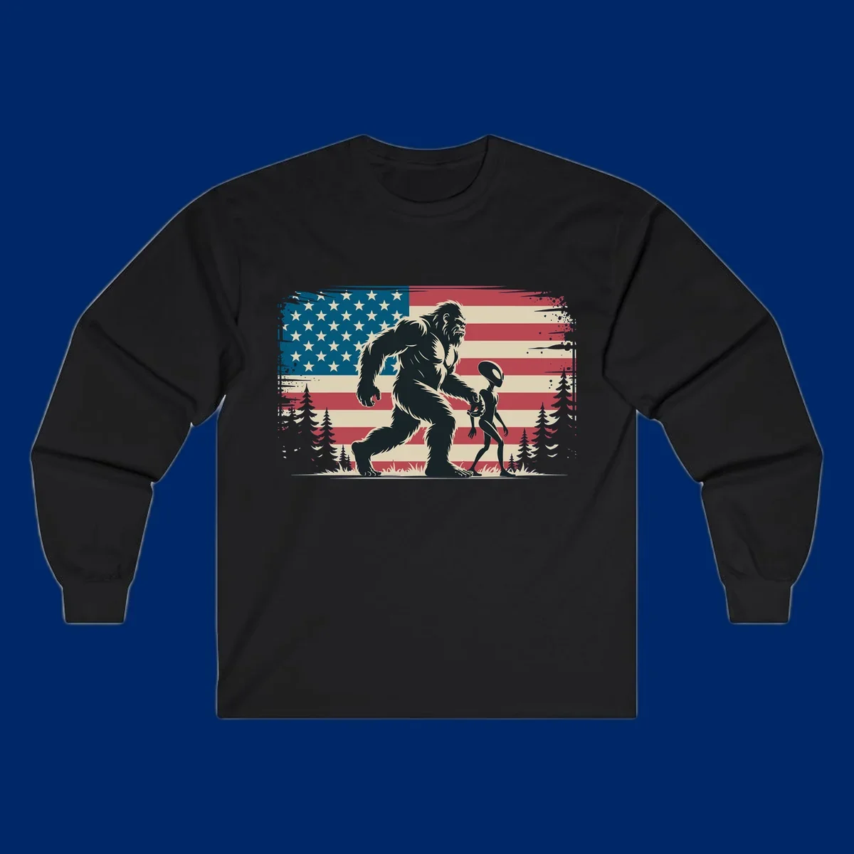 A vintage illustration of Bigfoot and a grey alien walking through a forest, set against a distressed bigfoot-alien-american-flag.
