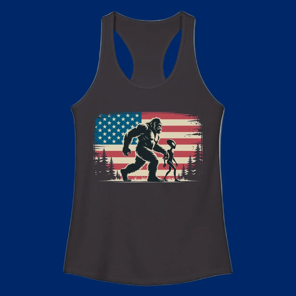 A vintage illustration of Bigfoot and a grey alien walking through a forest, set against a distressed bigfoot-alien-american-flag.