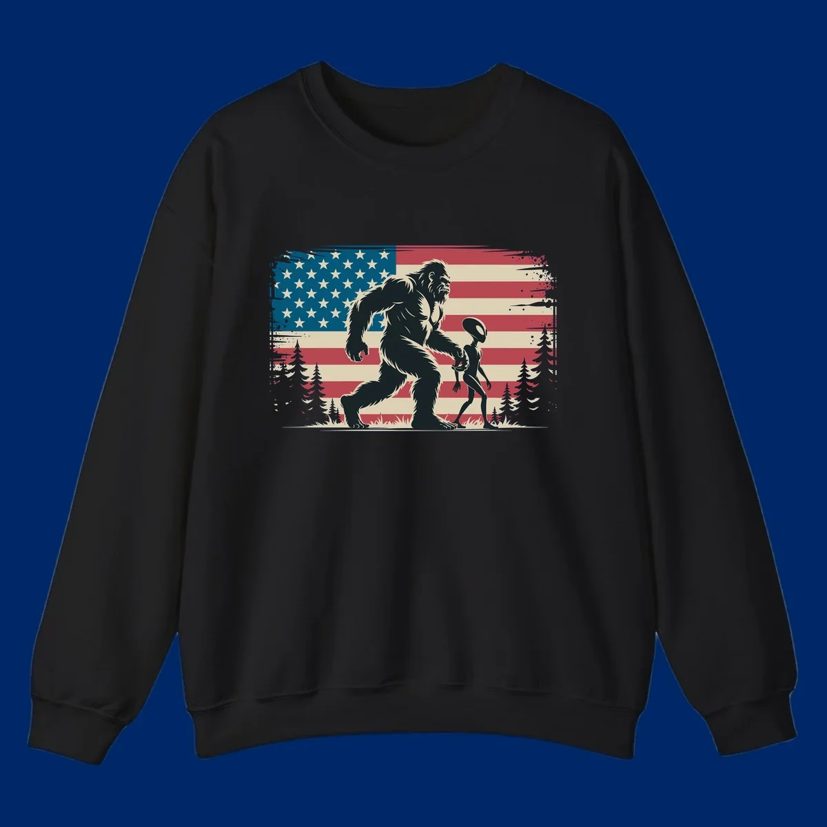 A vintage illustration of Bigfoot and a grey alien walking through a forest, set against a distressed bigfoot-alien-american-flag.