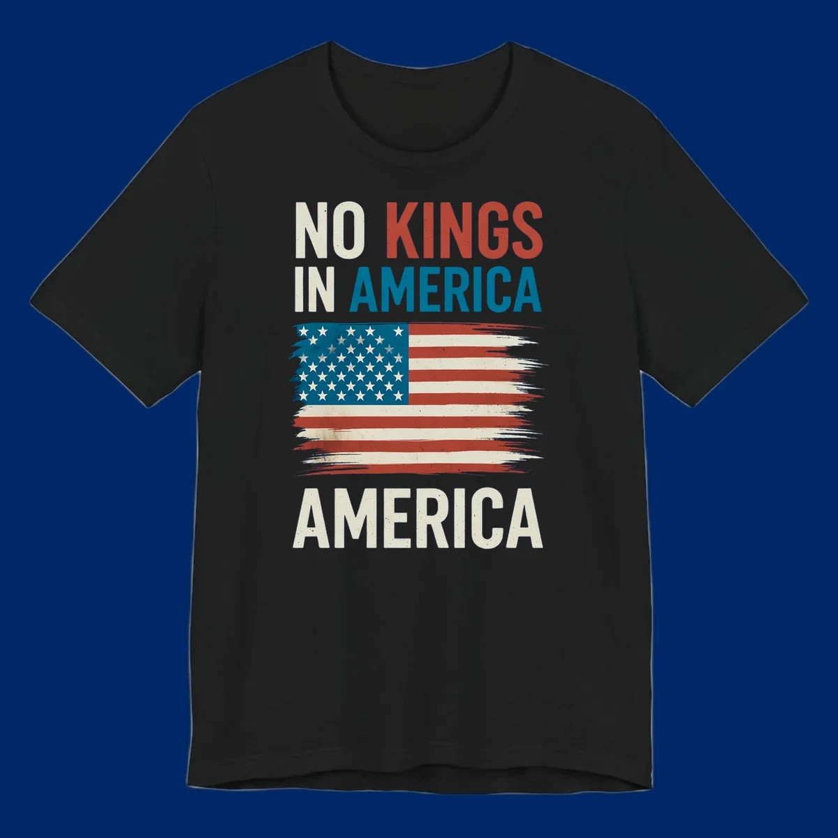 Distressed American flag design with the text 'NO KINGS IN AMERICA' above and 'AMERICA' below, representing the no-kings-in-america-flag concept.