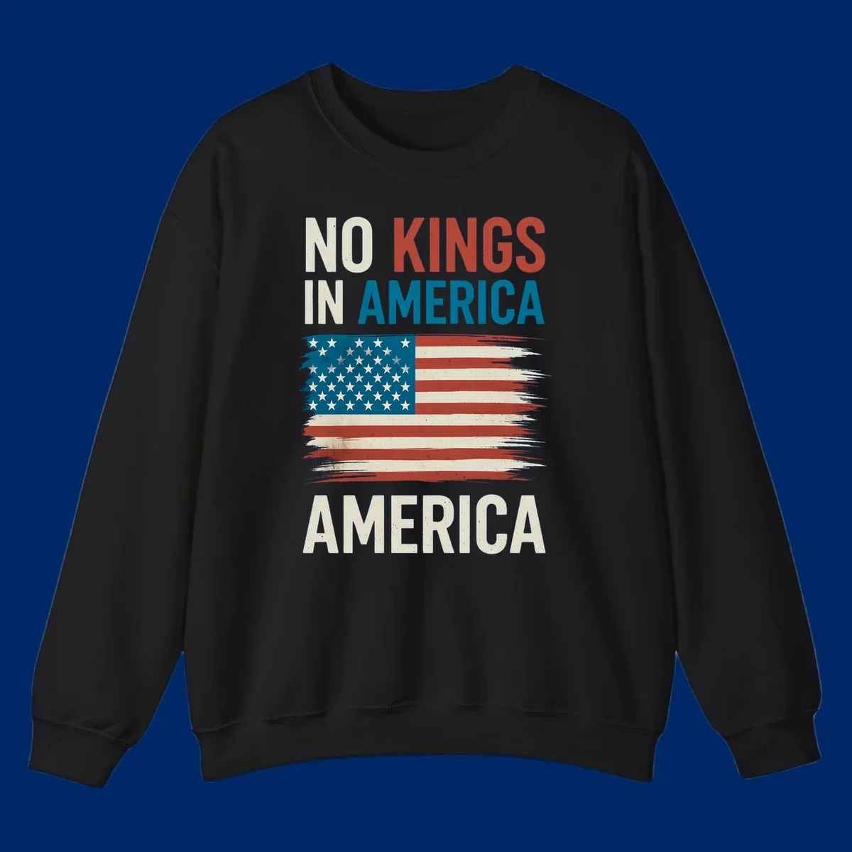 Distressed American flag design with the text 'NO KINGS IN AMERICA' above and 'AMERICA' below, representing the no-kings-in-america-flag concept.