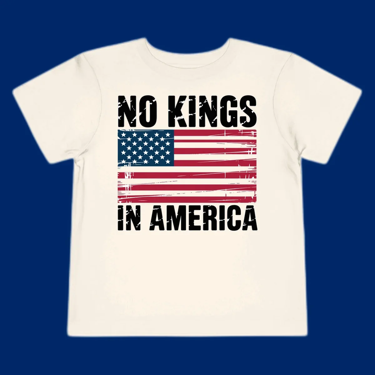Distressed American flag with 'NO KINGS' above and 'IN AMERICA' below, symbolizing the no-kings-america-flag concept.