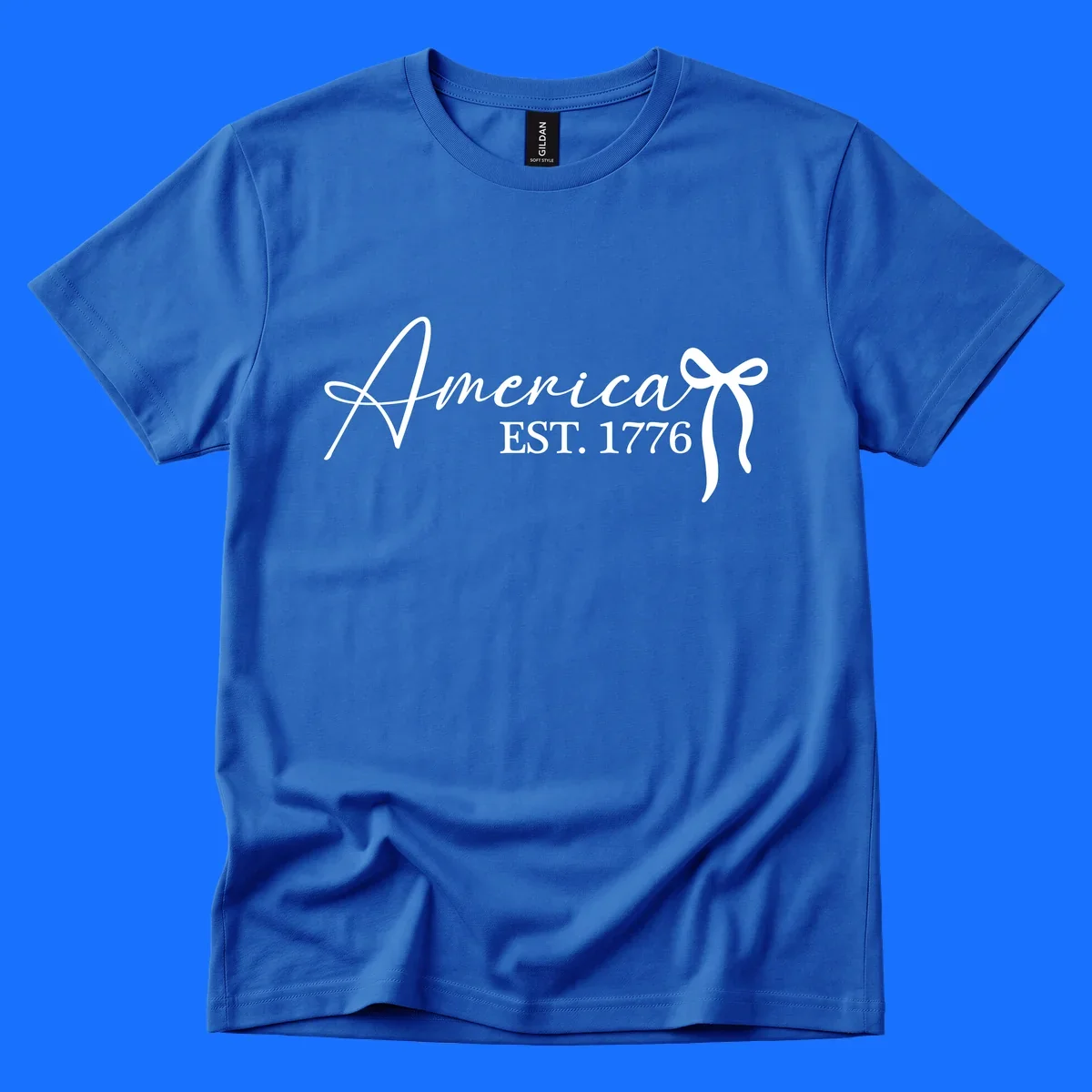 White script text "America" with decorative flourishes above "EST. 1776" in serif font, on a black background. Design for america-est-1776.