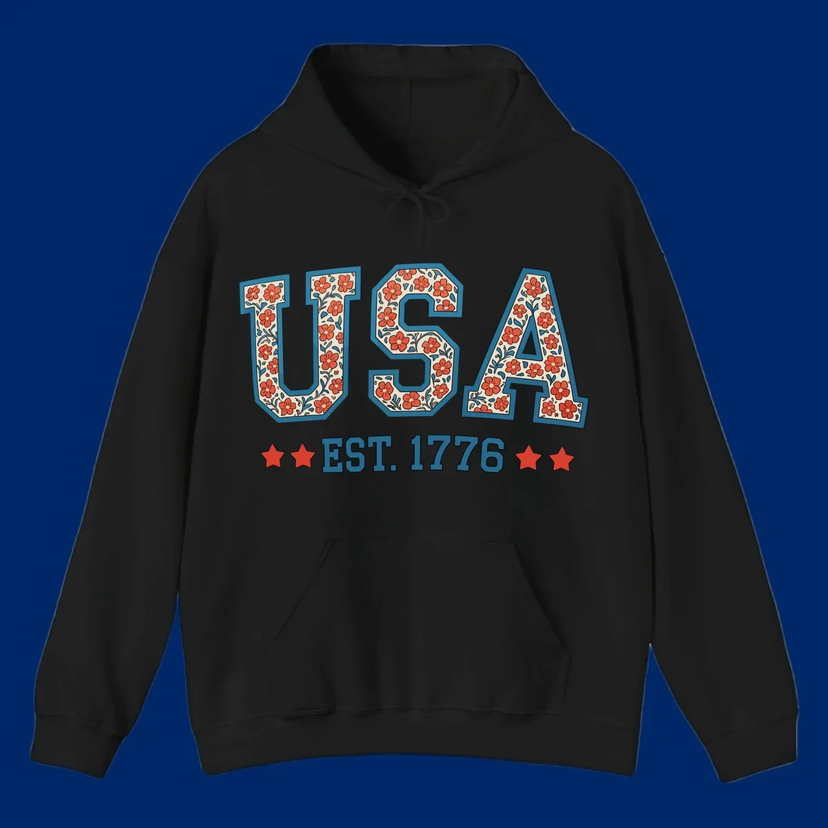 Illustrated text 'USA' with red flowers and blue leaves, above blue 'EST. 1776' text flanked by red stars. Concept: usa-est-1776-floral.