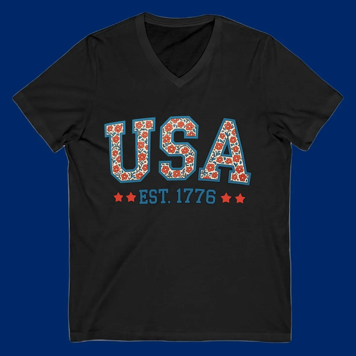 Illustrated text 'USA' with red flowers and blue leaves, above blue 'EST. 1776' text flanked by red stars. Concept: usa-est-1776-floral.