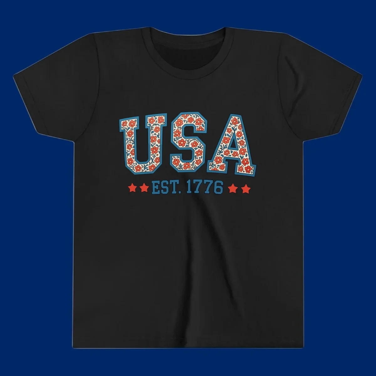 Illustrated text 'USA' with red flowers and blue leaves, above blue 'EST. 1776' text flanked by red stars. Concept: usa-est-1776-floral.