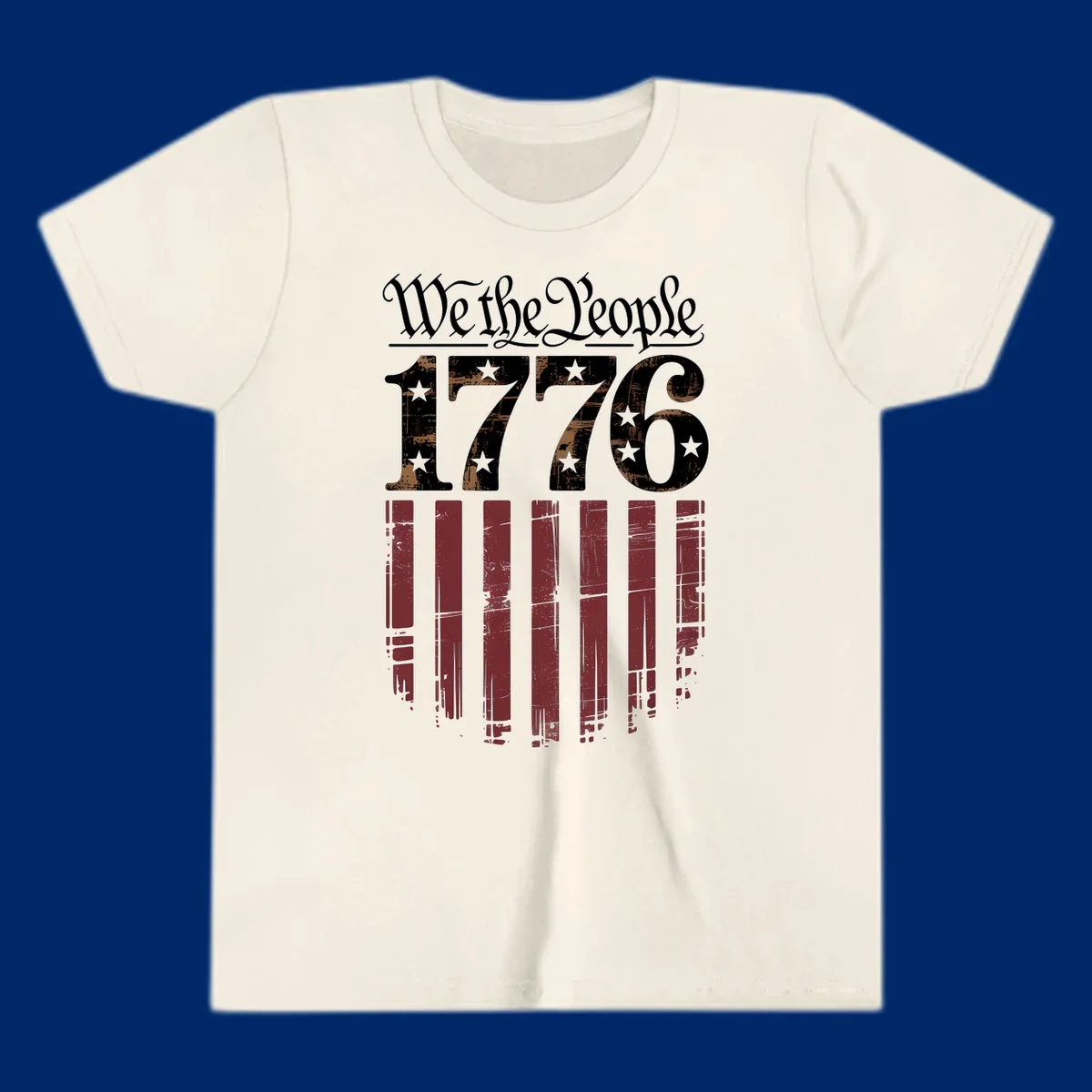 A distressed patriotic design featuring 'We the People' in script, '1776' with stars, and red stripes below, embodying the we-the-people-1776-flag theme.