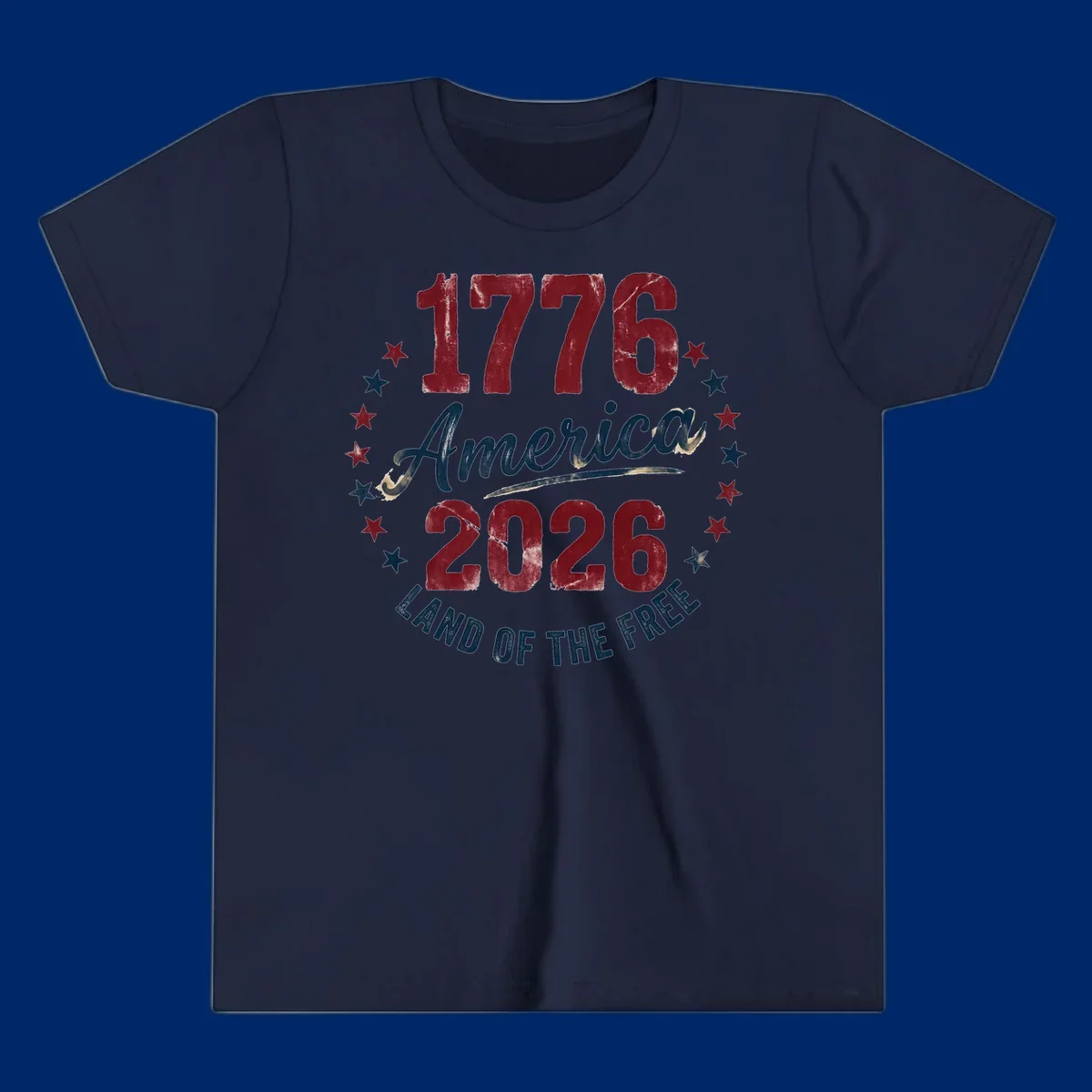 Distressed circular design with '1776', 'America', '2026', and 'LAND OF THE FREE' text, encircled by stars, celebrating America's 250th anniversary.