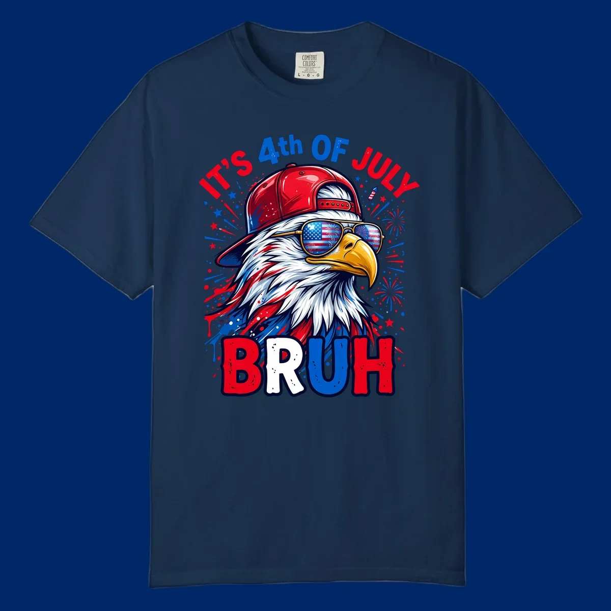 An illustrated bald eagle wearing a red cap and American flag sunglasses with fireworks and the text 'IT'S 4th OF JULY BRUH', emphasizing the fourth-of-july-bruh-eagle concept.